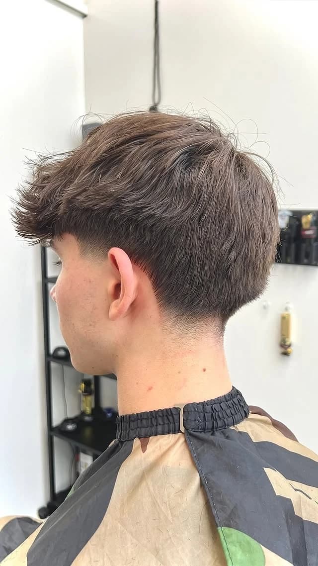 Textured spiky crop with a low taper, side view